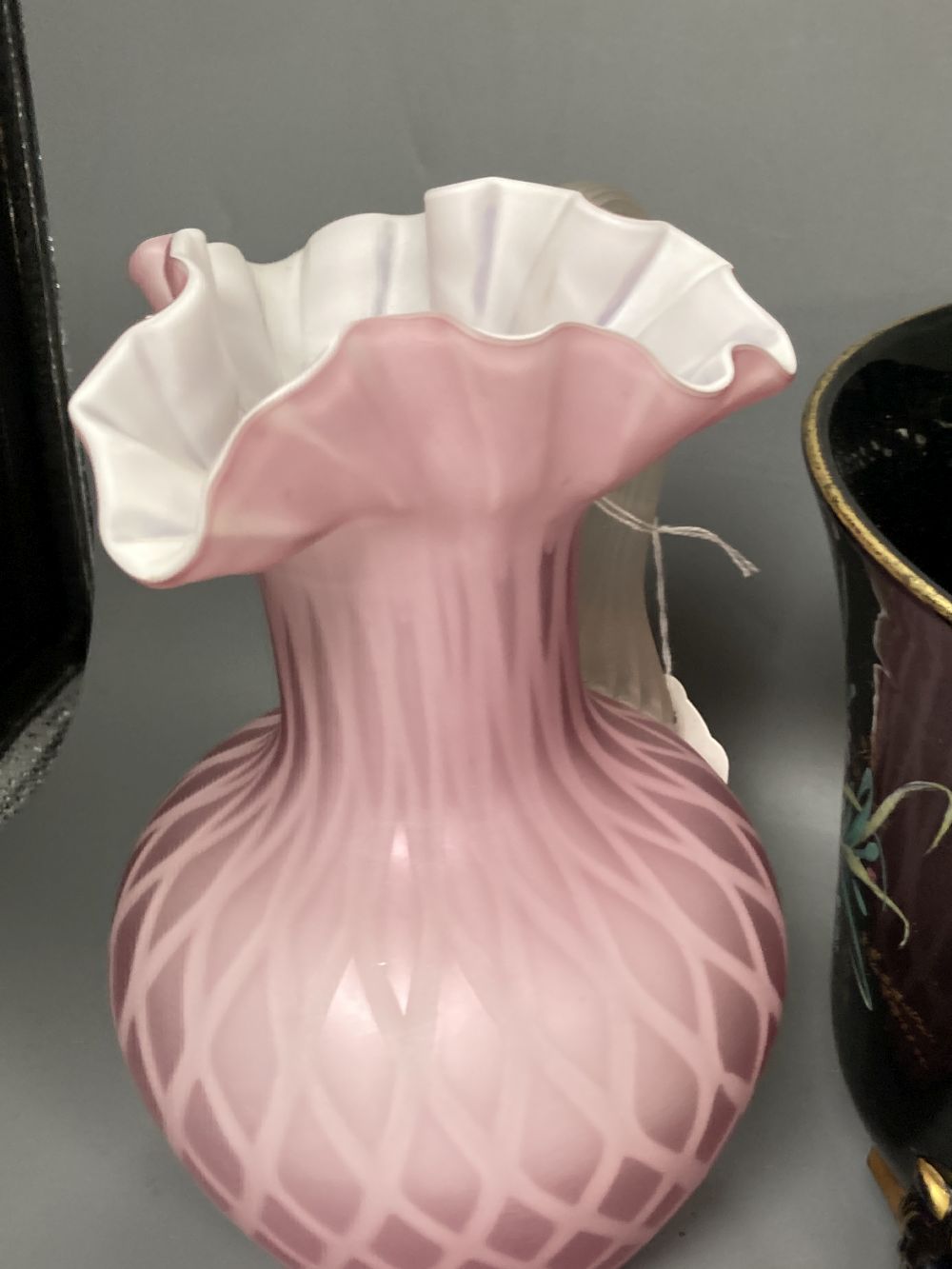 An opaline glass jug, an Edwardian jardiniere, a lustre mug and a novely whippet jug, 29cm